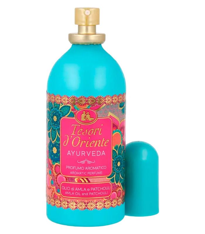 Духи Tesori d'Oriente Ayurveda с ароматом масла амлы и пачули. Бирюзовая бутылка с розовой этикеткой и золотым распылителем.
